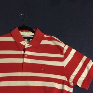 2 Polo T-shirts. 1 is Tommy Hilfiger. 1 is Izod.